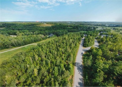 This large 1 acre wooded lot in Eagle Ridge Estates is located on Eagle Ridge Golf Course in Minnesota - for sale on GolfHomes.com, golf home, golf lot