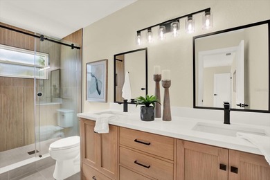 FABULOUS WATERFRONT POOL HOME IN HIGHLY DESIRABLE OAKHURST on The Tides Golf Club in Florida - for sale on GolfHomes.com, golf home, golf lot