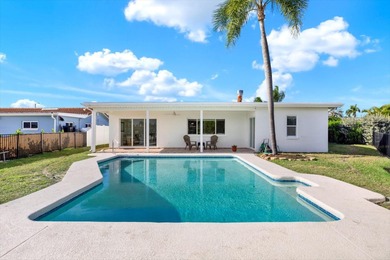 FABULOUS WATERFRONT POOL HOME IN HIGHLY DESIRABLE OAKHURST on The Tides Golf Club in Florida - for sale on GolfHomes.com, golf home, golf lot