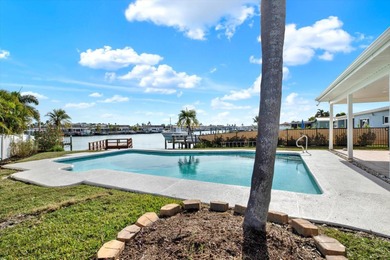 FABULOUS WATERFRONT POOL HOME IN HIGHLY DESIRABLE OAKHURST on The Tides Golf Club in Florida - for sale on GolfHomes.com, golf home, golf lot