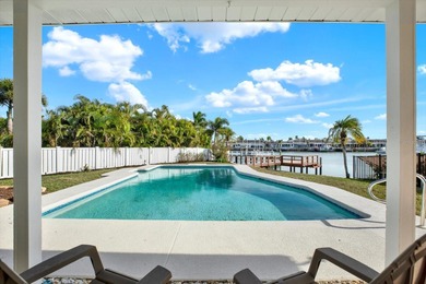 FABULOUS WATERFRONT POOL HOME IN HIGHLY DESIRABLE OAKHURST on The Tides Golf Club in Florida - for sale on GolfHomes.com, golf home, golf lot