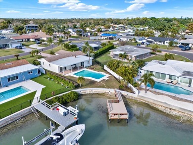 FABULOUS WATERFRONT POOL HOME IN HIGHLY DESIRABLE OAKHURST on The Tides Golf Club in Florida - for sale on GolfHomes.com, golf home, golf lot