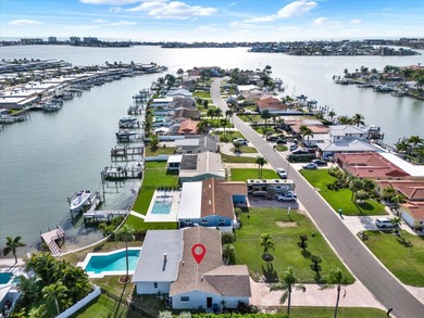 FABULOUS WATERFRONT POOL HOME IN HIGHLY DESIRABLE OAKHURST on The Tides Golf Club in Florida - for sale on GolfHomes.com, golf home, golf lot