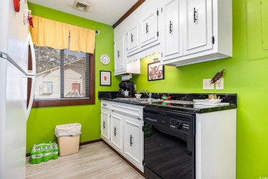 Welcome to this charming two-bedroom, two-bathroom end-unit on Myrtlewood Golf Course and Club  in South Carolina - for sale on GolfHomes.com, golf home, golf lot
