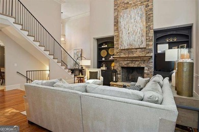 Discover timeless elegance and modern comfort in this on Woodmont Golf and Country Club in Georgia - for sale on GolfHomes.com, golf home, golf lot