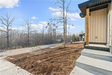 Welcome to this stunning new construction craftsman style home on Bella Vista Country Club - Highlands in Arkansas - for sale on GolfHomes.com, golf home, golf lot