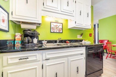Welcome to this charming two-bedroom, two-bathroom end-unit on Myrtlewood Golf Course and Club  in South Carolina - for sale on GolfHomes.com, golf home, golf lot