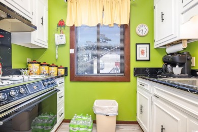 Welcome to this charming two-bedroom, two-bathroom end-unit on Myrtlewood Golf Course and Club  in South Carolina - for sale on GolfHomes.com, golf home, golf lot