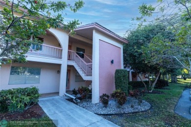 A breathtaking view and a peaceful living environment where life on Wynmoor Golf Course in Florida - for sale on GolfHomes.com, golf home, golf lot