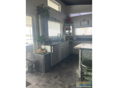 Rare intra-coastal property! Located on extra-large lot so on Long Island Golf Course in Texas - for sale on GolfHomes.com, golf home, golf lot
