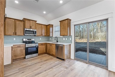 Welcome to this stunning new construction craftsman style home on Bella Vista Country Club - Highlands in Arkansas - for sale on GolfHomes.com, golf home, golf lot