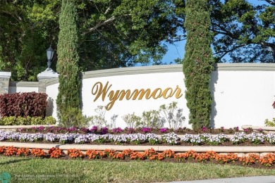 A breathtaking view and a peaceful living environment where life on Wynmoor Golf Course in Florida - for sale on GolfHomes.com, golf home, golf lot