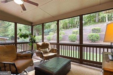 Discover timeless elegance and modern comfort in this on Woodmont Golf and Country Club in Georgia - for sale on GolfHomes.com, golf home, golf lot