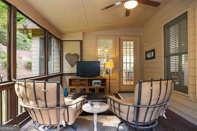 Discover timeless elegance and modern comfort in this on Woodmont Golf and Country Club in Georgia - for sale on GolfHomes.com, golf home, golf lot