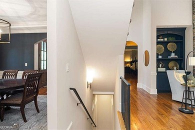 Discover timeless elegance and modern comfort in this on Woodmont Golf and Country Club in Georgia - for sale on GolfHomes.com, golf home, golf lot