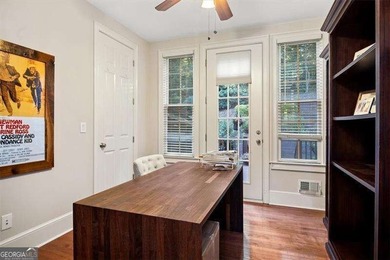 Discover timeless elegance and modern comfort in this on Woodmont Golf and Country Club in Georgia - for sale on GolfHomes.com, golf home, golf lot