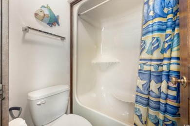 Welcome to this charming two-bedroom, two-bathroom end-unit on Myrtlewood Golf Course and Club  in South Carolina - for sale on GolfHomes.com, golf home, golf lot