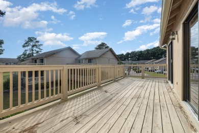 Welcome to this charming two-bedroom, two-bathroom end-unit on Myrtlewood Golf Course and Club  in South Carolina - for sale on GolfHomes.com, golf home, golf lot