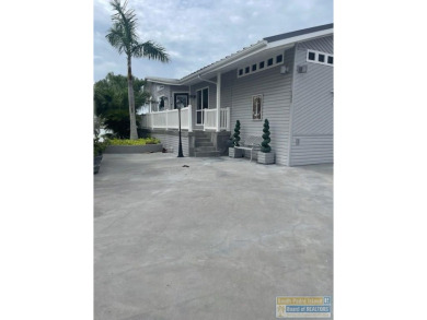 Rare intra-coastal property! Located on extra-large lot so on Long Island Golf Course in Texas - for sale on GolfHomes.com, golf home, golf lot