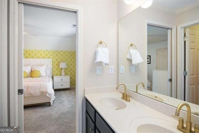 Discover timeless elegance and modern comfort in this on Woodmont Golf and Country Club in Georgia - for sale on GolfHomes.com, golf home, golf lot