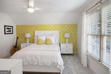 Discover timeless elegance and modern comfort in this on Woodmont Golf and Country Club in Georgia - for sale on GolfHomes.com, golf home, golf lot