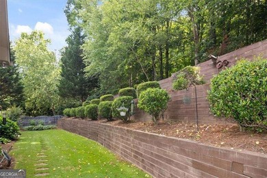 Discover timeless elegance and modern comfort in this on Woodmont Golf and Country Club in Georgia - for sale on GolfHomes.com, golf home, golf lot