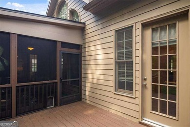 Discover timeless elegance and modern comfort in this on Woodmont Golf and Country Club in Georgia - for sale on GolfHomes.com, golf home, golf lot