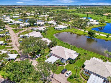 Stunning waterfront views in this villa home located in the on Plantation Golf and Country Club in Florida - for sale on GolfHomes.com, golf home, golf lot