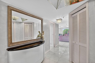 Spectacular golf, lake & tropical garden views from your wrap on Fountains Golf and Country Club in Florida - for sale on GolfHomes.com, golf home, golf lot