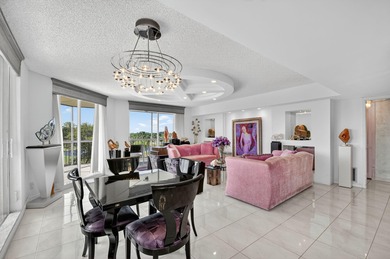 Spectacular golf, lake & tropical garden views from your wrap on Fountains Golf and Country Club in Florida - for sale on GolfHomes.com, golf home, golf lot