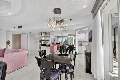 Spectacular golf, lake & tropical garden views from your wrap on Fountains Golf and Country Club in Florida - for sale on GolfHomes.com, golf home, golf lot