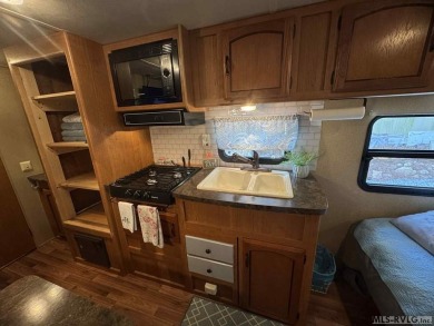 Move - in ready getaway!! Don't miss this charming 2 bedroom, 1 on River Ridge Golf Club in Virginia - for sale on GolfHomes.com, golf home, golf lot