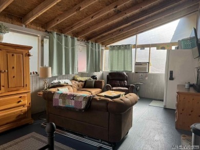 Move - in ready getaway!! Don't miss this charming 2 bedroom, 1 on River Ridge Golf Club in Virginia - for sale on GolfHomes.com, golf home, golf lot