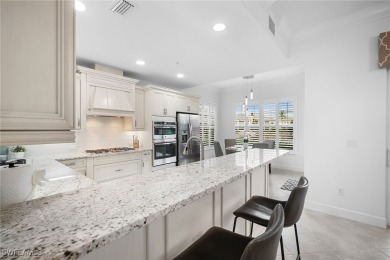 Experience this exceptional end-unit Coach Home, located within on Lely Resort Golf and Country Club in Florida - for sale on GolfHomes.com, golf home, golf lot