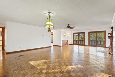 Stunning Hideaway Lake Retreat with Partial Water Views on Hide-A-Way Lake Golf Course in Texas - for sale on GolfHomes.com, golf home, golf lot