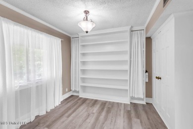 Rare find! This charming 3 bedroom 2 bath condo in Lanai Village on Diamondhead Country Club in Mississippi - for sale on GolfHomes.com, golf home, golf lot