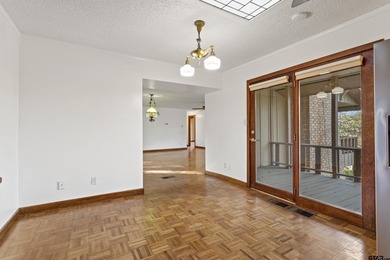 Stunning Hideaway Lake Retreat with Partial Water Views on Hide-A-Way Lake Golf Course in Texas - for sale on GolfHomes.com, golf home, golf lot