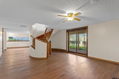 Stunning Hideaway Lake Retreat with Partial Water Views on Hide-A-Way Lake Golf Course in Texas - for sale on GolfHomes.com, golf home, golf lot