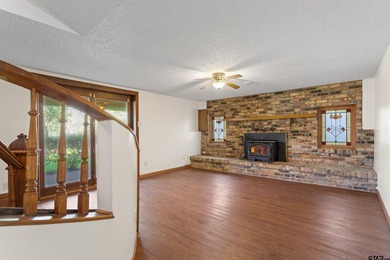 Stunning Hideaway Lake Retreat with Partial Water Views on Hide-A-Way Lake Golf Course in Texas - for sale on GolfHomes.com, golf home, golf lot