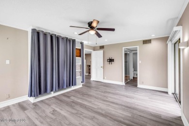 Rare find! This charming 3 bedroom 2 bath condo in Lanai Village on Diamondhead Country Club in Mississippi - for sale on GolfHomes.com, golf home, golf lot