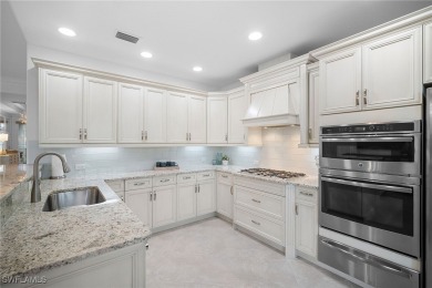 Experience this exceptional end-unit Coach Home, located within on Lely Resort Golf and Country Club in Florida - for sale on GolfHomes.com, golf home, golf lot