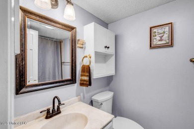 Rare find! This charming 3 bedroom 2 bath condo in Lanai Village on Diamondhead Country Club in Mississippi - for sale on GolfHomes.com, golf home, golf lot