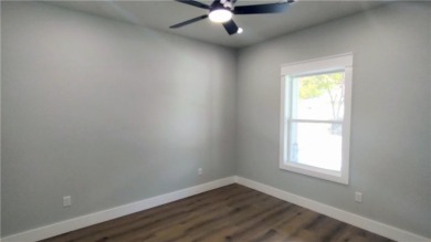 Beautiful New Custom Home in Bella Vista! Situated on a .33-acre on Bella Vista - Metfield Golf Complex and Country Club in Arkansas - for sale on GolfHomes.com, golf home, golf lot