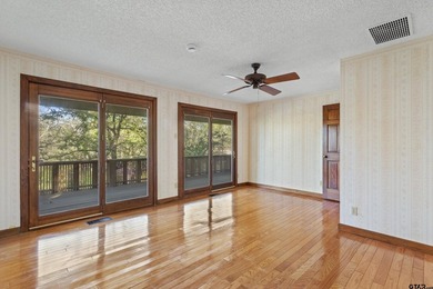 Stunning Hideaway Lake Retreat with Partial Water Views on Hide-A-Way Lake Golf Course in Texas - for sale on GolfHomes.com, golf home, golf lot