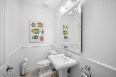 Experience this exceptional end-unit Coach Home, located within on Lely Resort Golf and Country Club in Florida - for sale on GolfHomes.com, golf home, golf lot