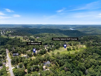 Quality lake area home with 2 large primary suites located on on Holiday Island Golf Course in Arkansas - for sale on GolfHomes.com, golf home, golf lot