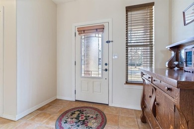 Quality lake area home with 2 large primary suites located on on Holiday Island Golf Course in Arkansas - for sale on GolfHomes.com, golf home, golf lot