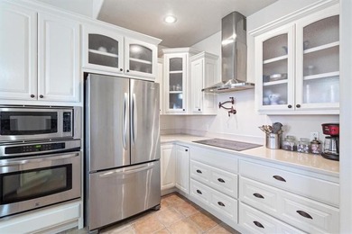 Quality lake area home with 2 large primary suites located on on Holiday Island Golf Course in Arkansas - for sale on GolfHomes.com, golf home, golf lot