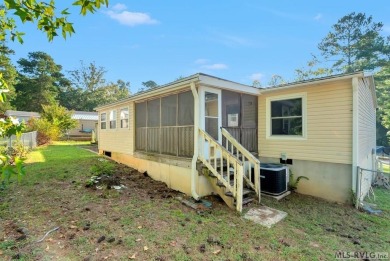 This spacious doublewide offers new  laminate flooring and on River Ridge Golf Club in Virginia - for sale on GolfHomes.com, golf home, golf lot
