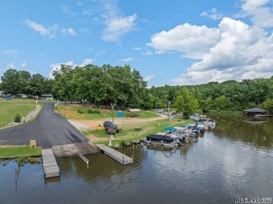 This spacious doublewide offers new  laminate flooring and on River Ridge Golf Club in Virginia - for sale on GolfHomes.com, golf home, golf lot